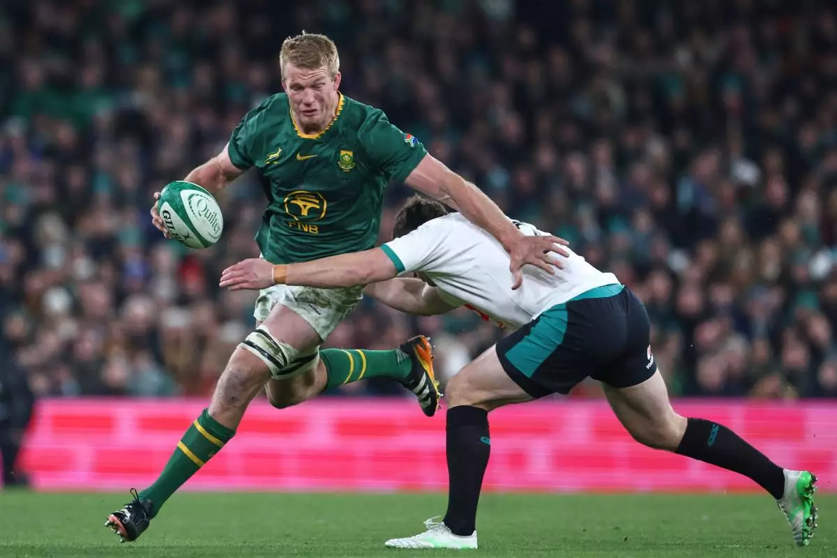 FILE - South Africa's Pieter-Steph du Toit is tackle by Ireland's Dan Sheehan during the rugby union Nations Series match between Ireland and South Africa in Dublin, Ireland, Nov. 22, 2025. (AP Photo/Peter Morrison, File)