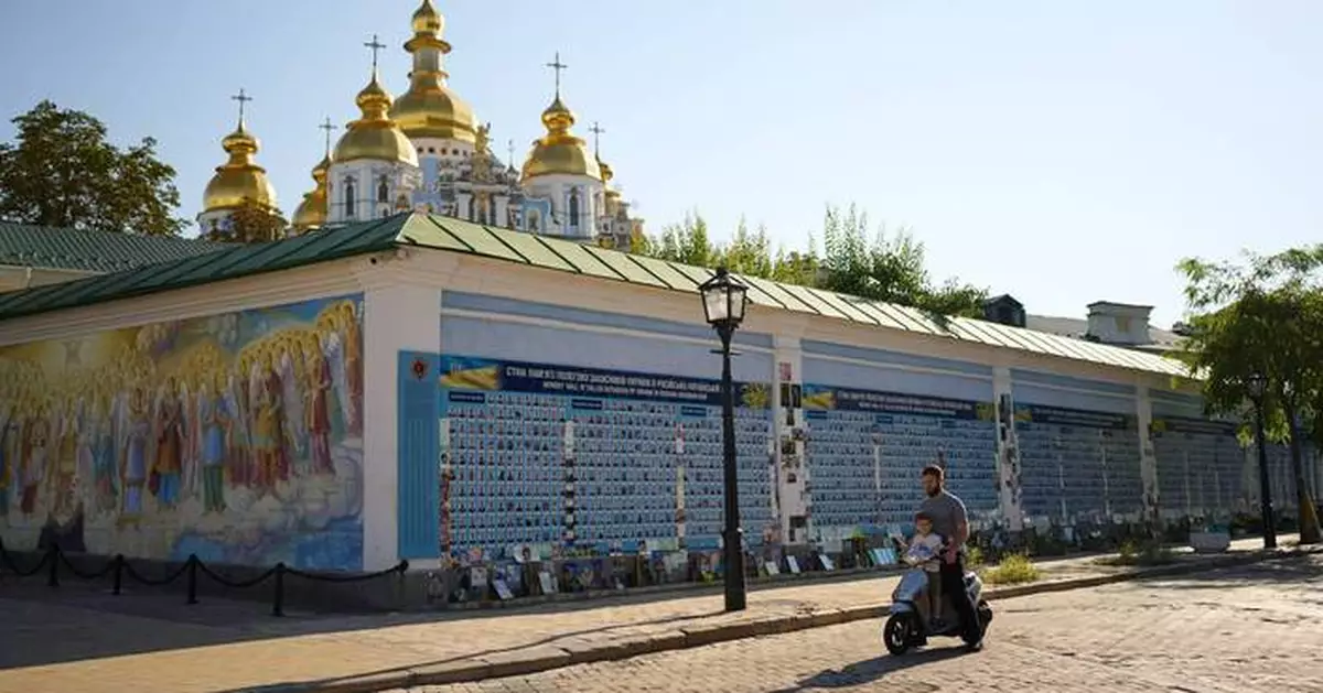Russian drones kill 14 people at a shopping mall in a central Ukrainian city, officials say