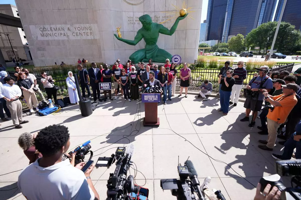 Abdul El-Sayed speaks during a news conference at the Spirit of Detroit shortly after winning the Democratic nomination for U.S. Senate in Michigan, Wednesday, Aug. 5, 2026, in Detroit. (AP Photo/Julia Demaree Nikhinson)