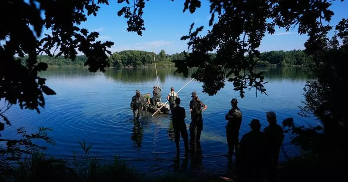 Photos show European fishers on the brink as summer drought parches rivers, lakes and farms