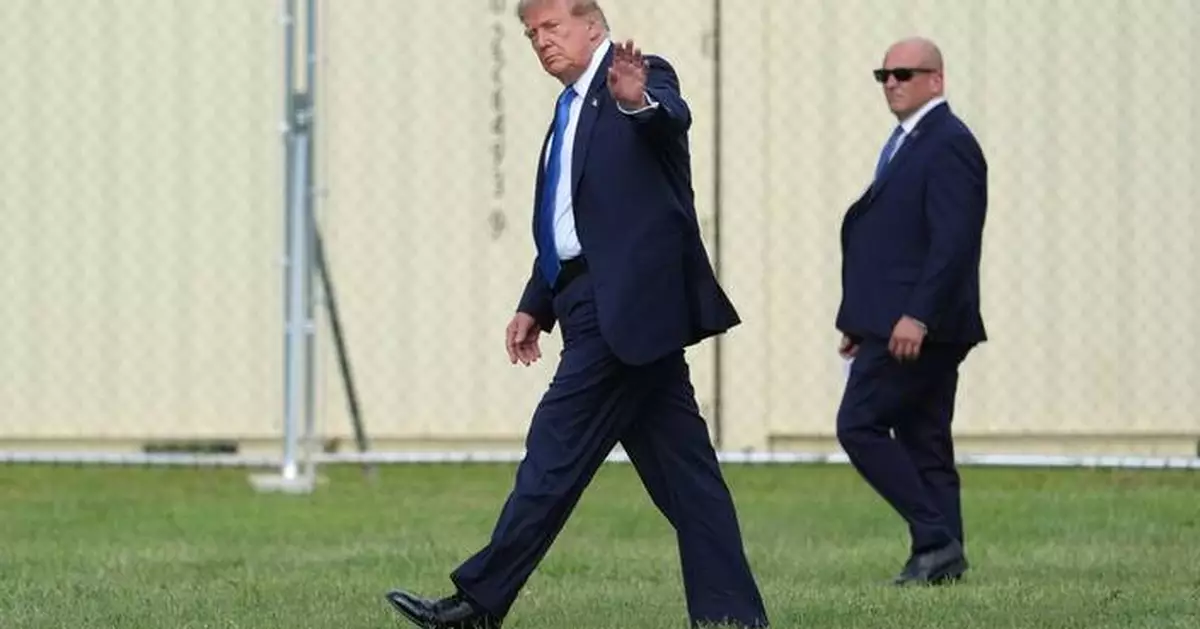 The Latest: US pump prices remained above $4 a gallon throughout August for first time, AAA says