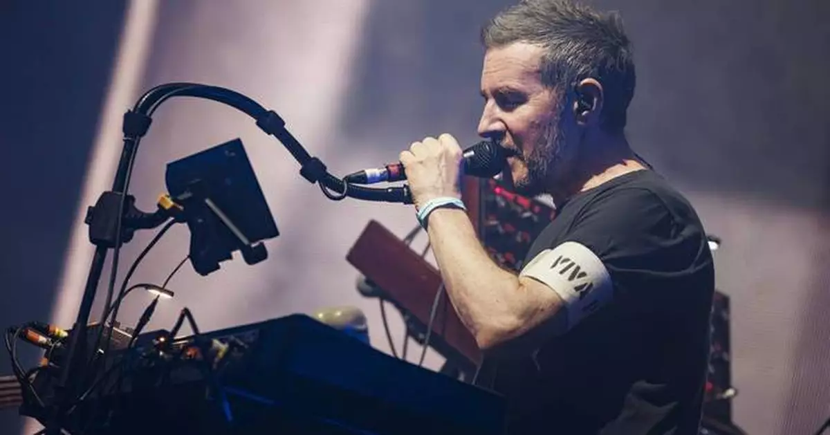 Singapore bans 2 Massive Attack members after pro-Palestine display at concert