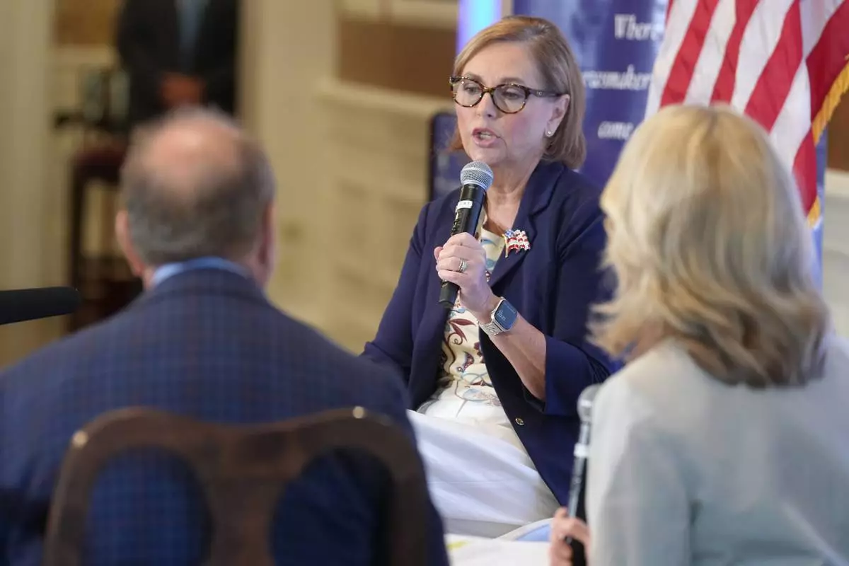 U.S. Sen. Darline Graham, R-S.C., answers questions during a forum for candidates competing in a special Republican Senate primary runoff to replace her late brother, U.S. Sen. Lindsey Graham, R-S.C., Monday, Aug. 17, 2026, in Greenville, S.C. (AP Photo/Meg Kinnard)