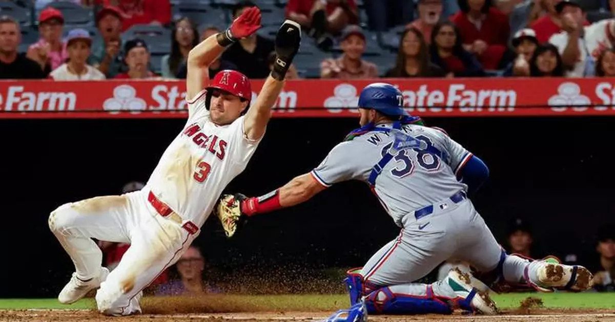 Ureña pitches Angels past Rangers 7-0 as Trout and Guzman lead offense with 3 hits apiece