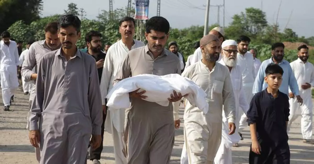 Pakistani investigators visiting hospital nursery where fire killed 14 newborns