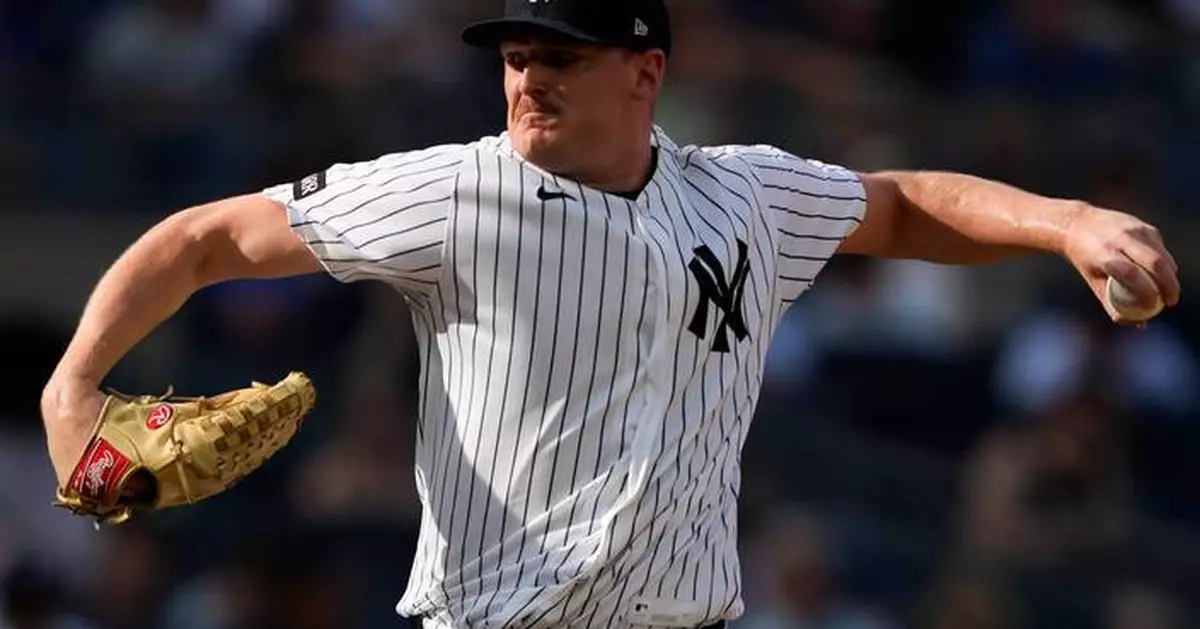 Cole, Yankees hold off Braves 5-4 in matchup of Cy Young winners