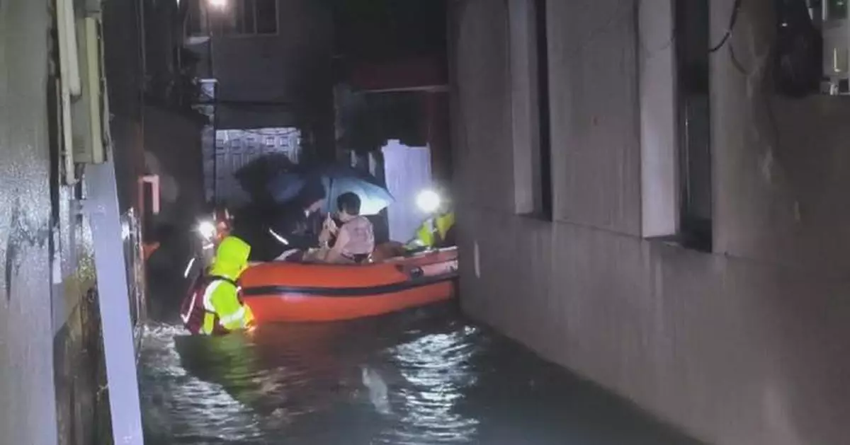 Firefighters rescue trapped people as Typhoon Dolphin batters coastal Zhejiang