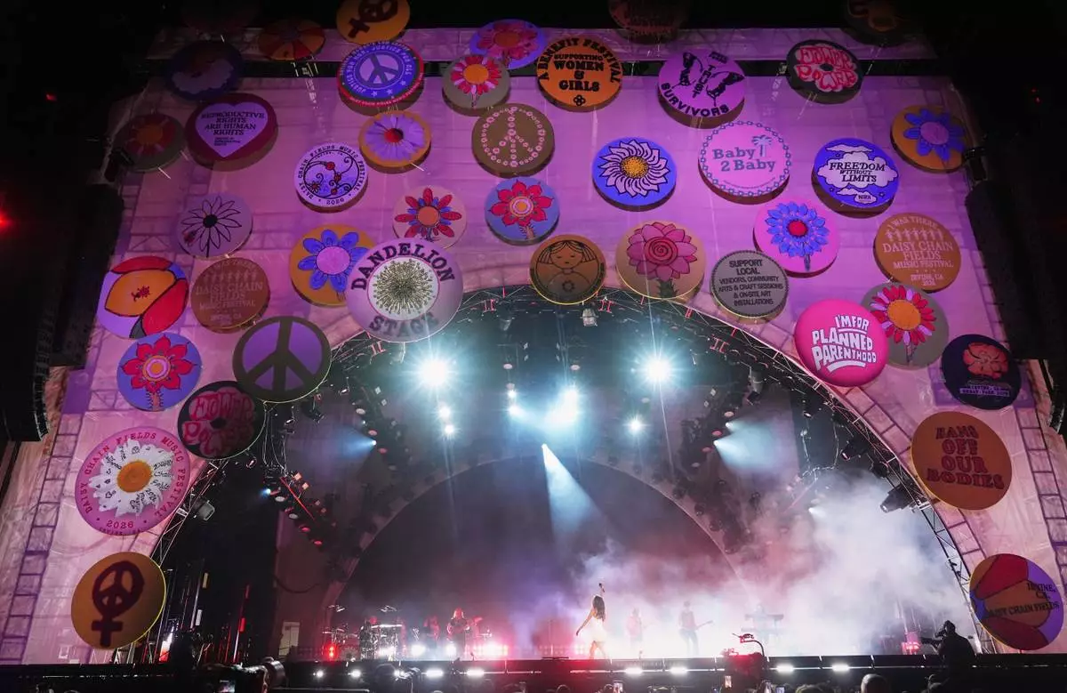 Olivia Rodrigo performs her headlining set on the Dandelion Stage at the Daisy Chain Fields Music Festival on Saturday, Aug. 29, 2026, at Great Park in Irvine, Calif. (AP Photo/Chris Pizzello)