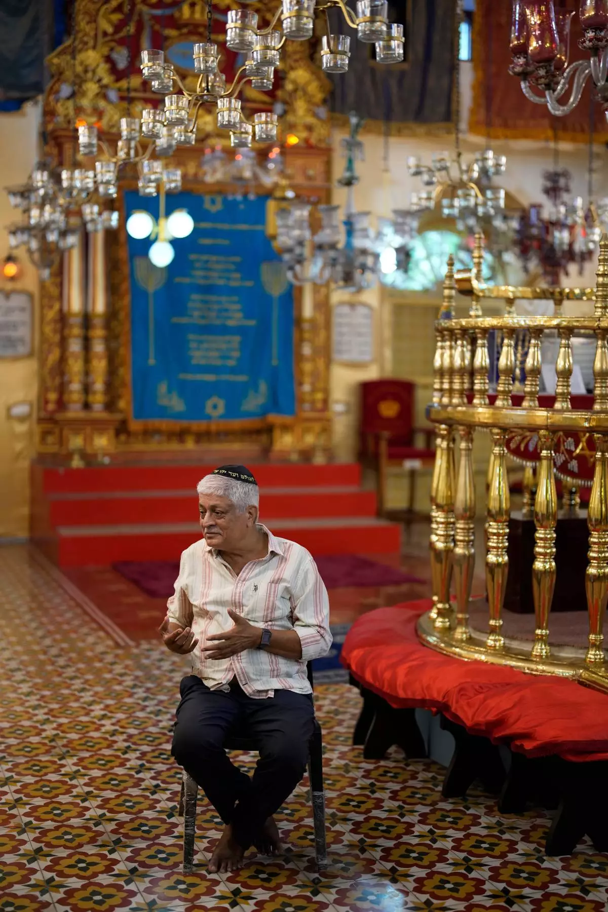 Elias Josephai, a Malabari Jew, speaks to his guests at the 12th-century Kadavumbagam Synagogue in Ernakulam, mainland district of Kochi, India, Thursday, May 21, 2026. (AP Photo/Aijaz Rahi)