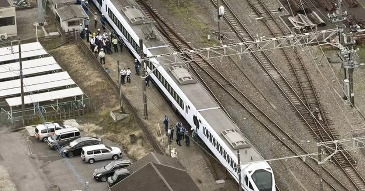 Express train hits and kills 4 workers at a railway station in Japan