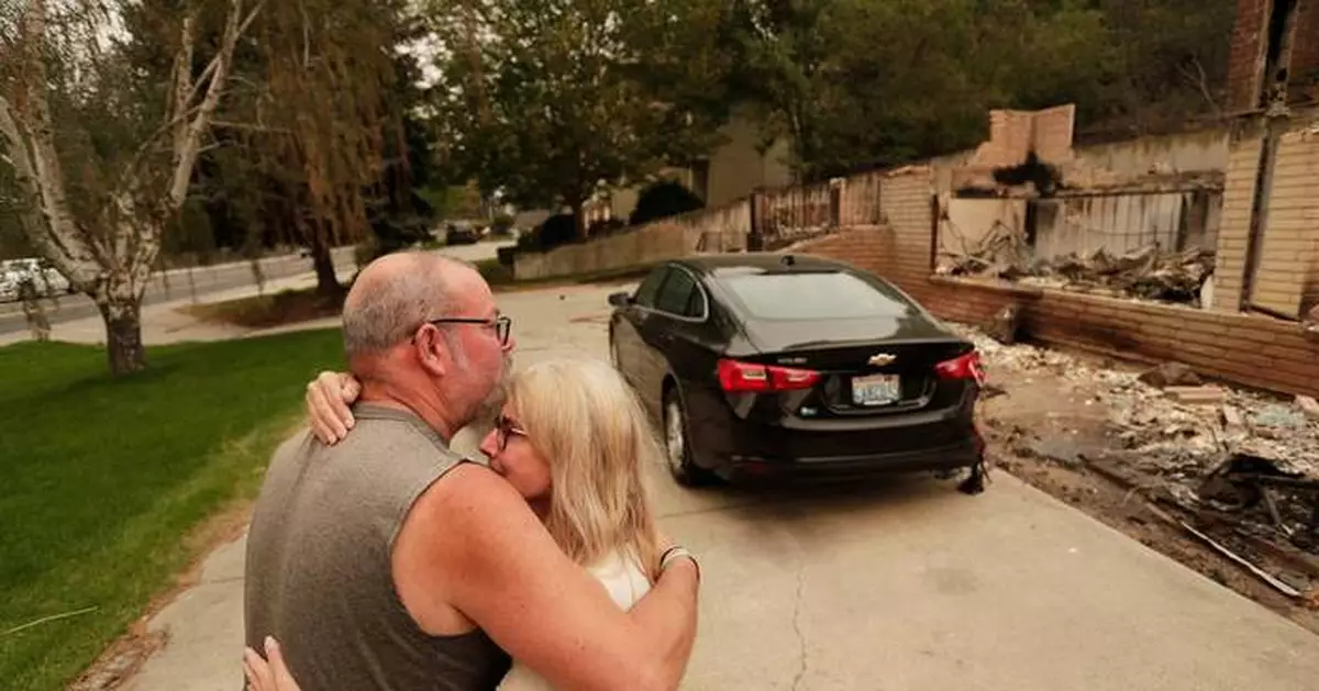 Washington state fires destroy hundreds of structures and force Spokane-area residents to evacuate