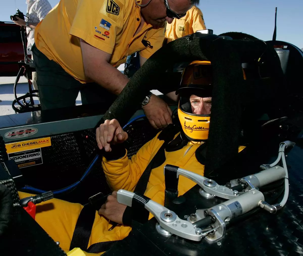 FILE - British driver Andy Green gets strapped into his seat before setting a new unofficial world diesel powered land speed record of over 328 mph over two runs Tuesday, Aug. 22, 2006, on the Bonneville Salt Flats of Utah. (AP Photo/Douglas C. Pizac,File)