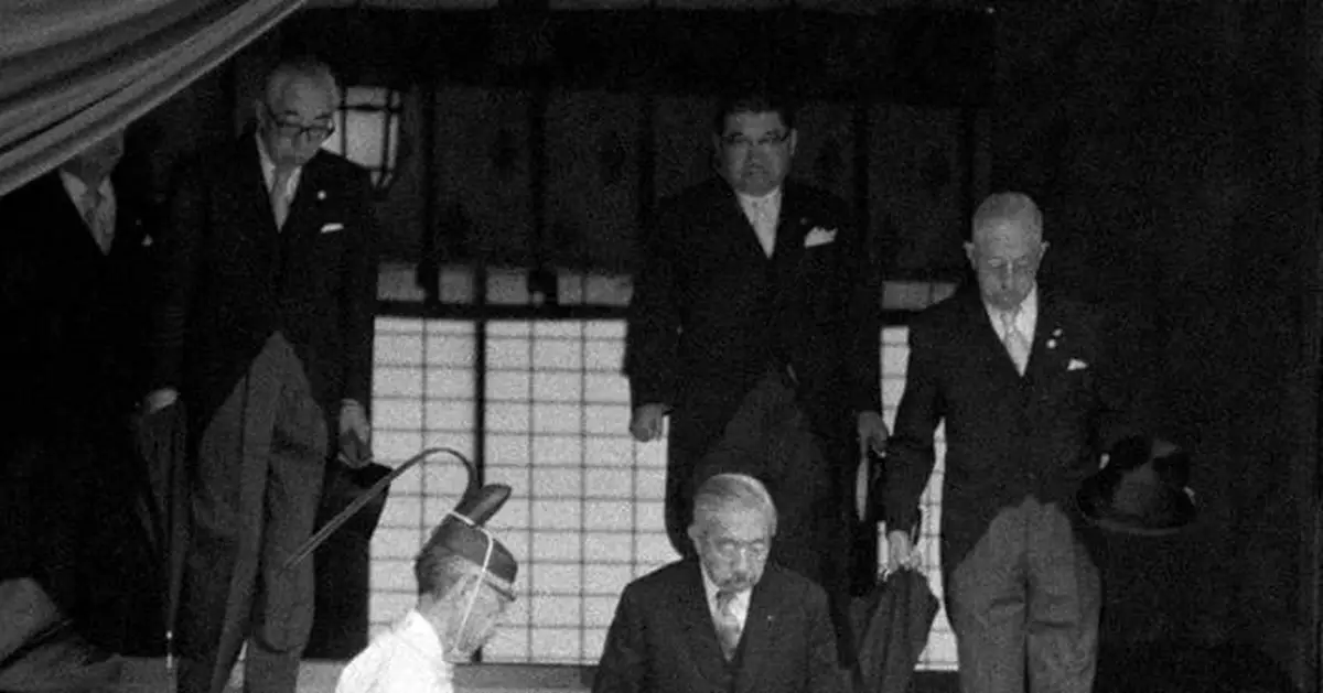 Japan's defense chief visits shrine neighbors see as symbol of Japanese militarism