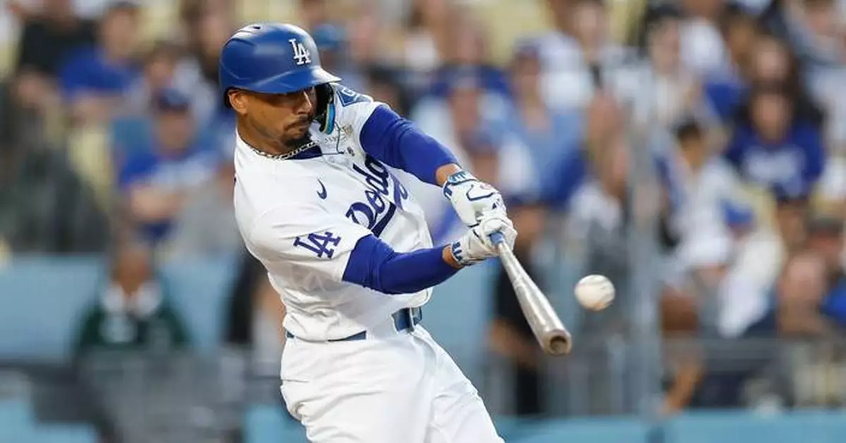 Max Muncy’s 10th-inning single lifts the Dodgers past the Royals 5-4