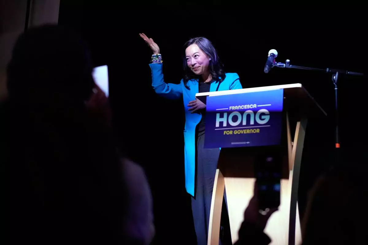 Democratic gubernatorial candidate Francesca Hong gestures after speaking during a primary election night watch party Tuesday, Aug. 11, 2026, in Madison, Wis. (AP Photo/Nam Y. Huh)