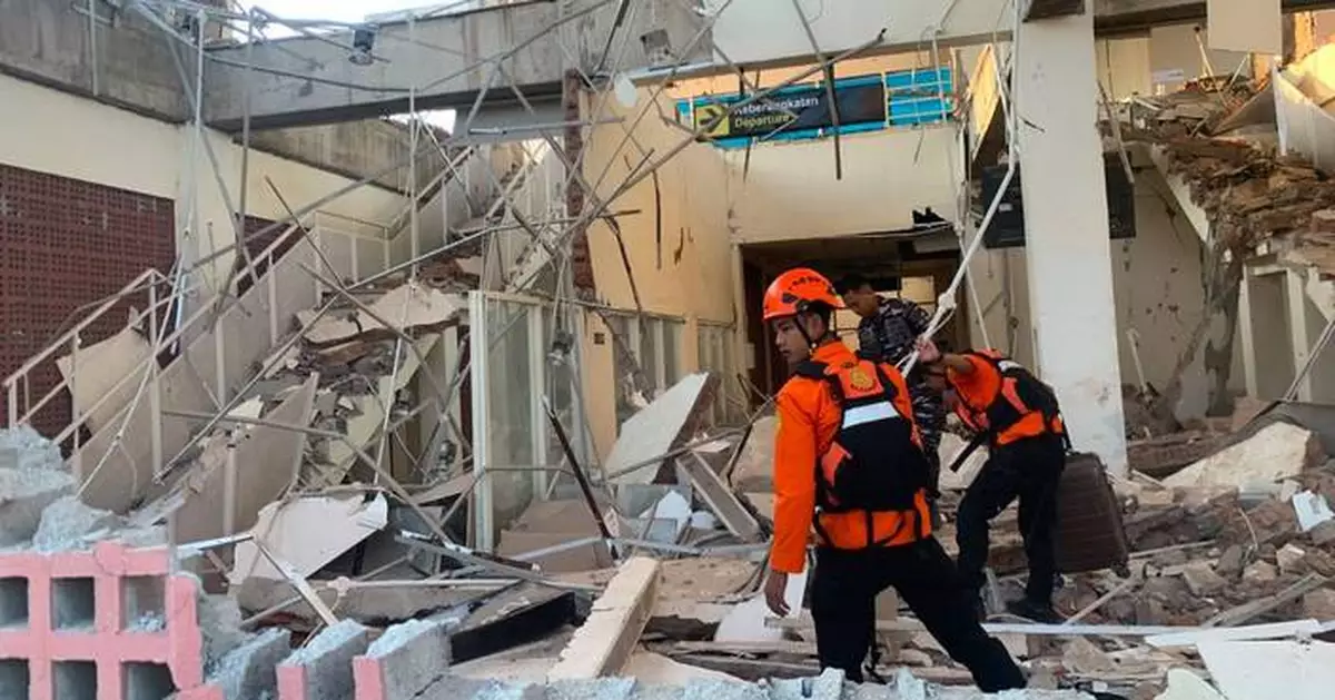 Rescuers dig through rubble and landslides after Indonesia quake kills 47
