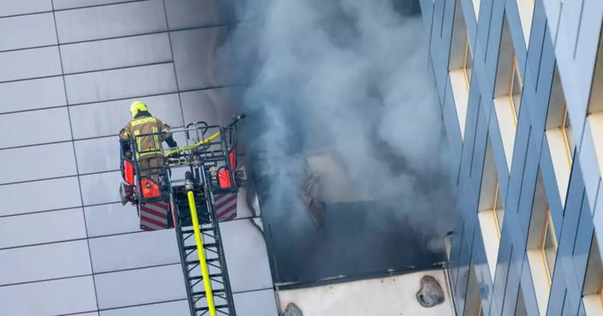 Fire in Berlin high-rise injured 5, prompted some residents to consider jumping to safety