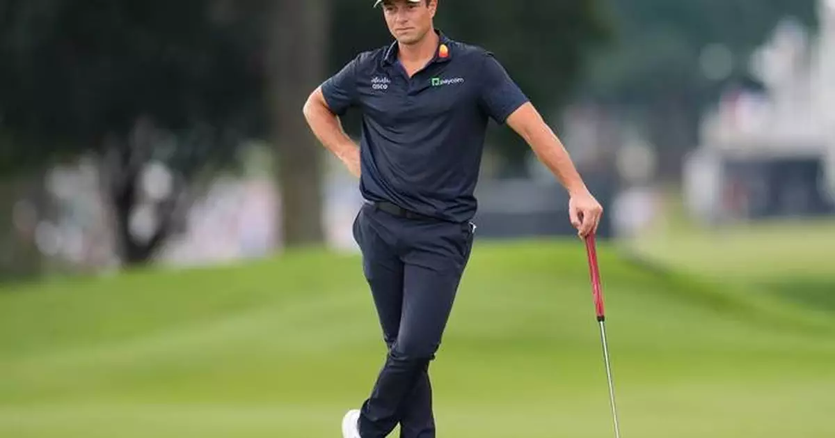 Hovland surges to a 1-shot lead at Tour Championship with cast of challengers lined up behind him