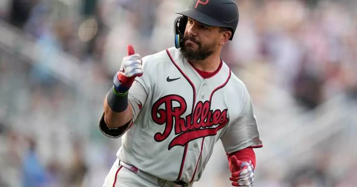 Phillies homer 3 times into the Field of Dreams corn in 7-1 win over Twins, with pair from Schwarber