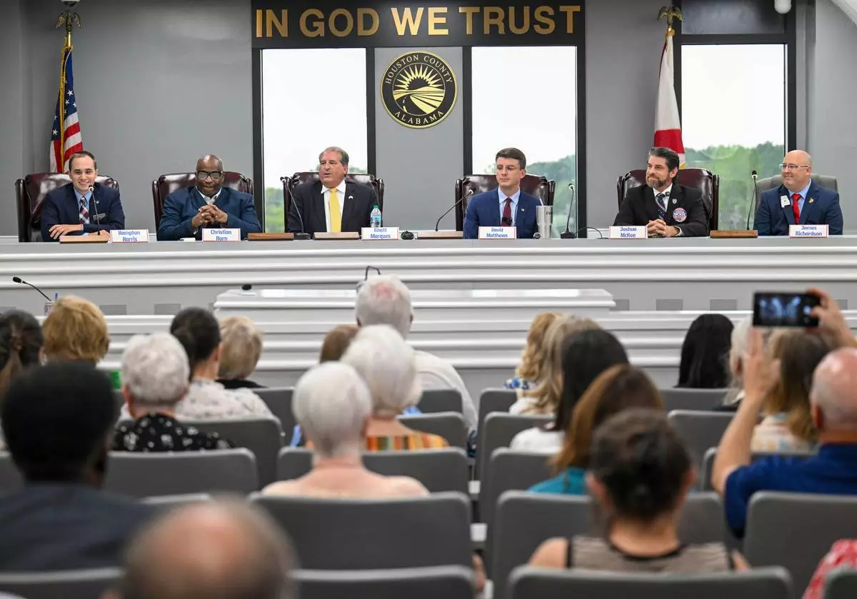 FILE - Candidates for U.S. Congressional District 2 speak to attendees, July 27, 2026, during a Houston County Republican Meet the Candidates event in Dothan, Ala. (AP Photo/Julie Bennett, File)
