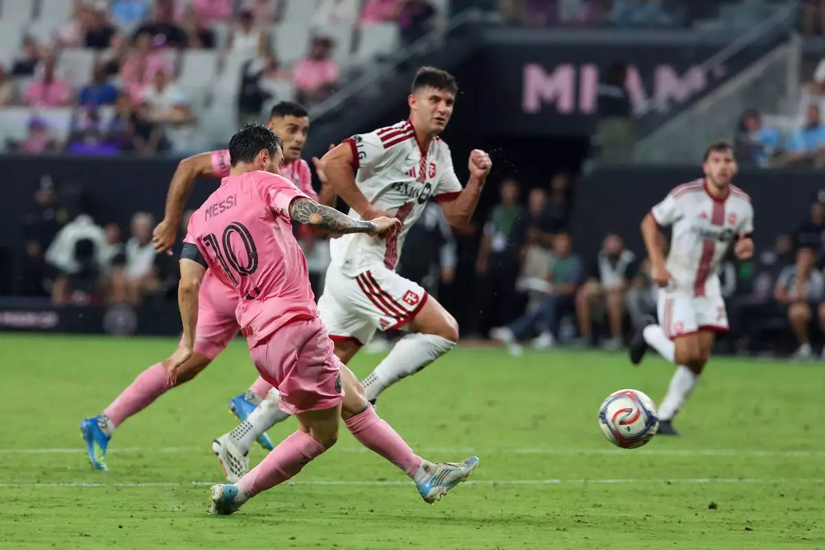 Inter Miami forward Leo Messi (10) takes a shot to score during the second half of an MLS soccer game against Toronto FC on Saturday, Aug. 22, 2026, in Miami. (AP Photo/David Santiago)