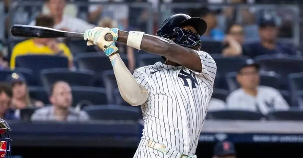 Rice drives in 3 runs as Yankees beat Red Sox 9-2 to earn a doubleheader split