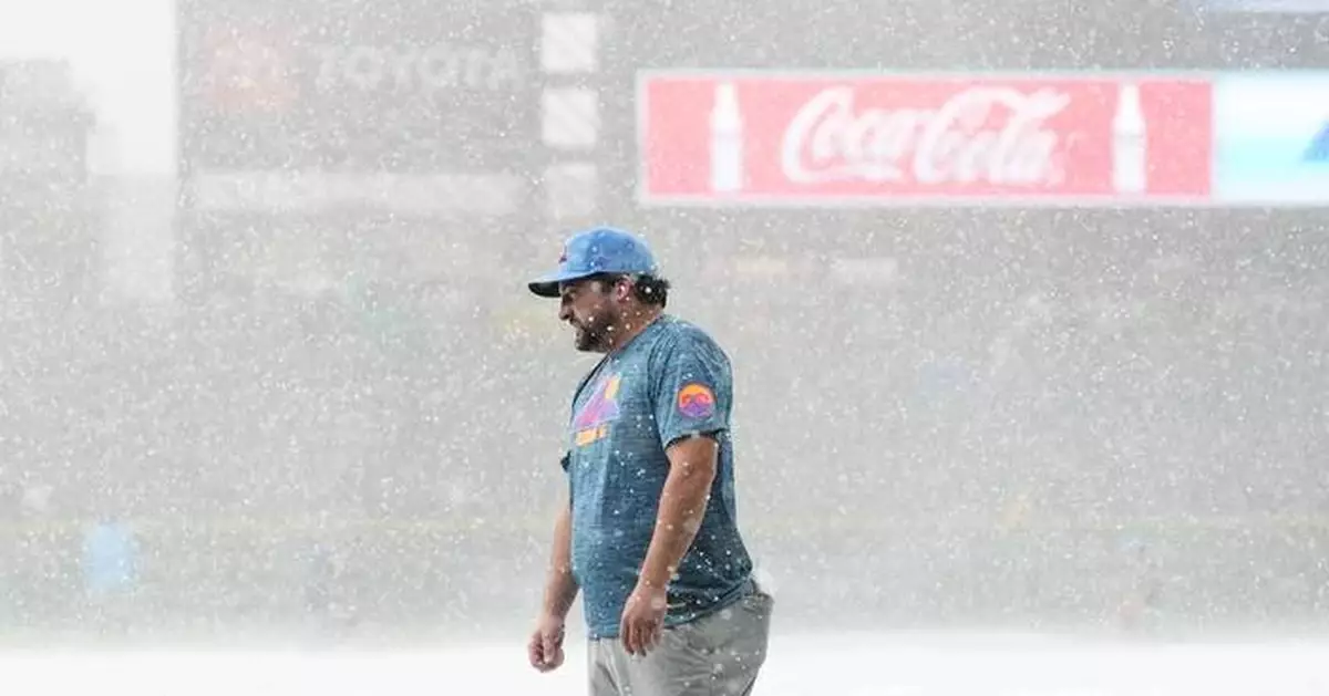 Sugano helps the Rockies beat the Royals 3-1 in game delayed at start by hailstorm