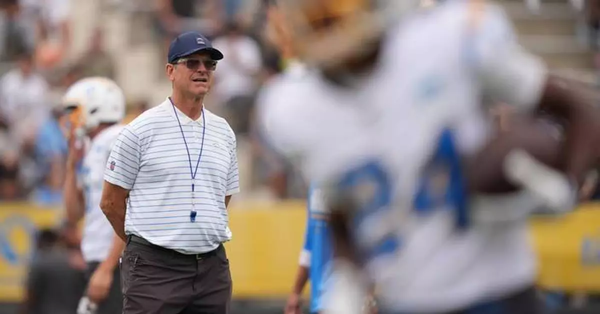 Harbaugh's Chargers honor late Billy Ray Smith before practicing in San Diego
