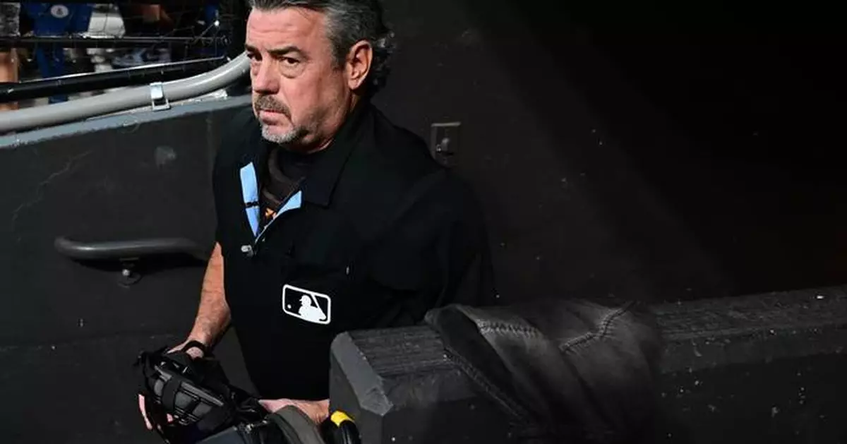 Umpire Jordan Baker out of Giants-Guards game due to concussion symptoms after foul ball hits mask