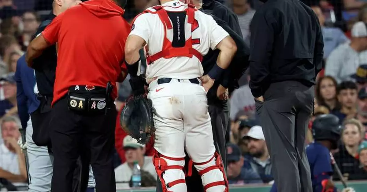 Plate umpire leaves Mariners-Red Sox game after foul ball catches him under the chin