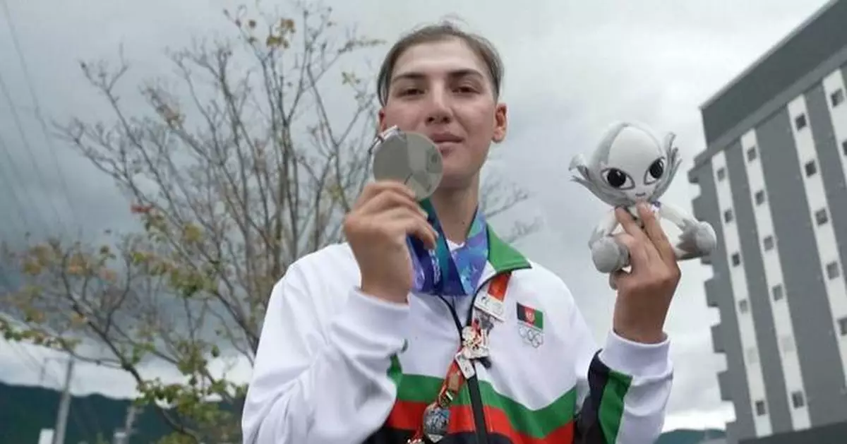 Afghan female cyclist wins silver at Asian Games after disguising herself as a man to train