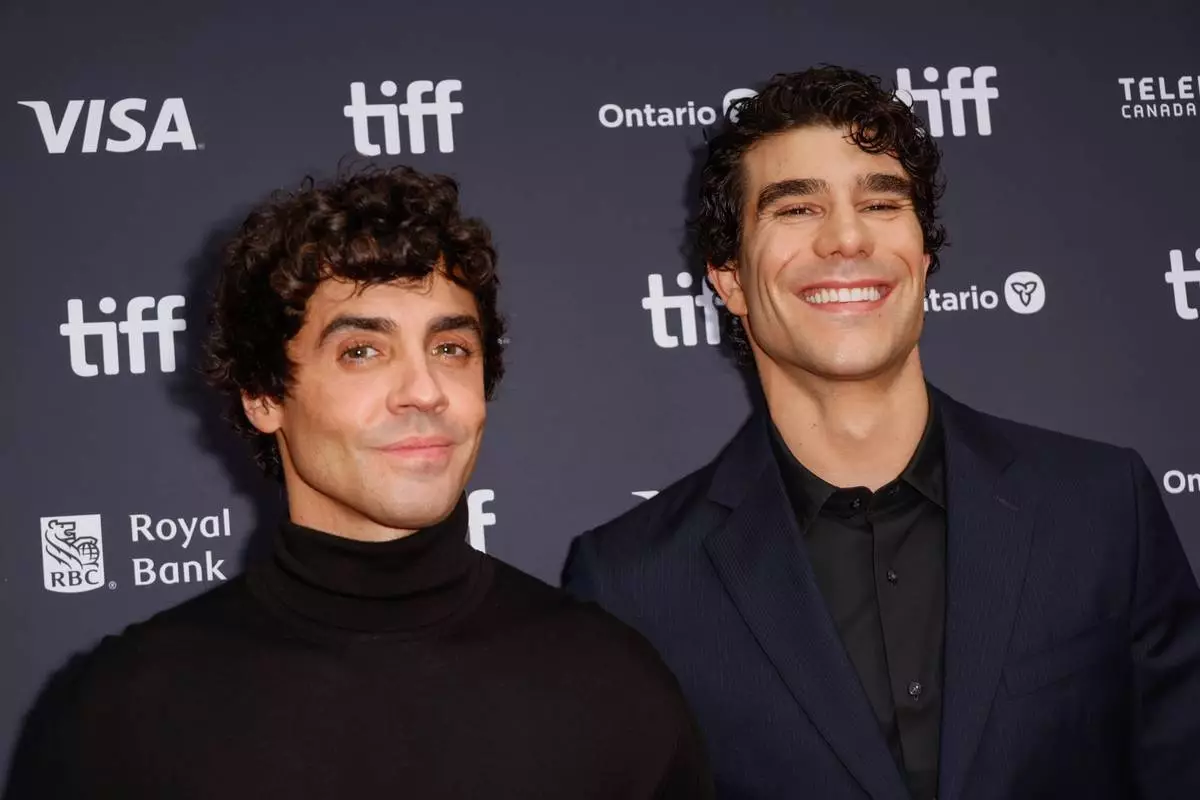 Director Javier Ambrossi, left, and Javier Calvo attend the premiere of "La Bola Negra" at the Princess of Wales Theatre during the Toronto International Film Festival on Tuesday, Sept. 15, 2026, in Toronto. (Photo by Joel C Ryan/Invision/AP)