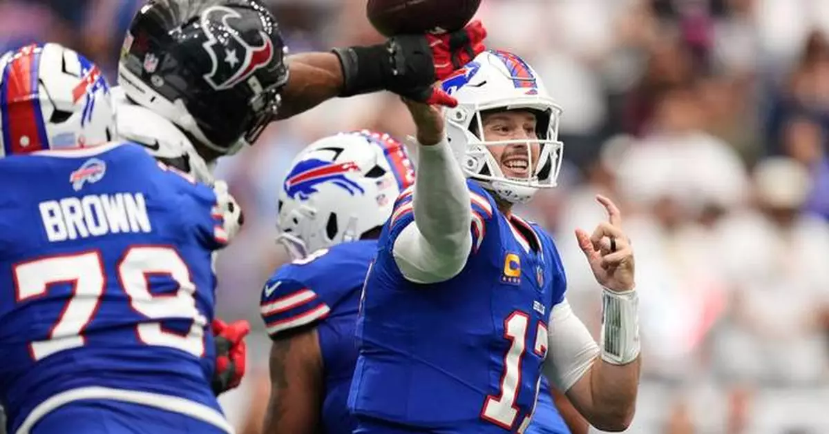 Josh Allen connects with Joshua Palmer for a late TD and Bills beat Texans 36-31 in wild opener