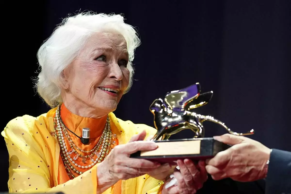 Ellen Burstyn receives the golden lion for lifetime achievement during the 83rd edition of the Venice Film Festival inl in Venice, Italy, on Monday, Sept. 7, 2026. (Photo by Scott A Garfitt/Invision/AP)