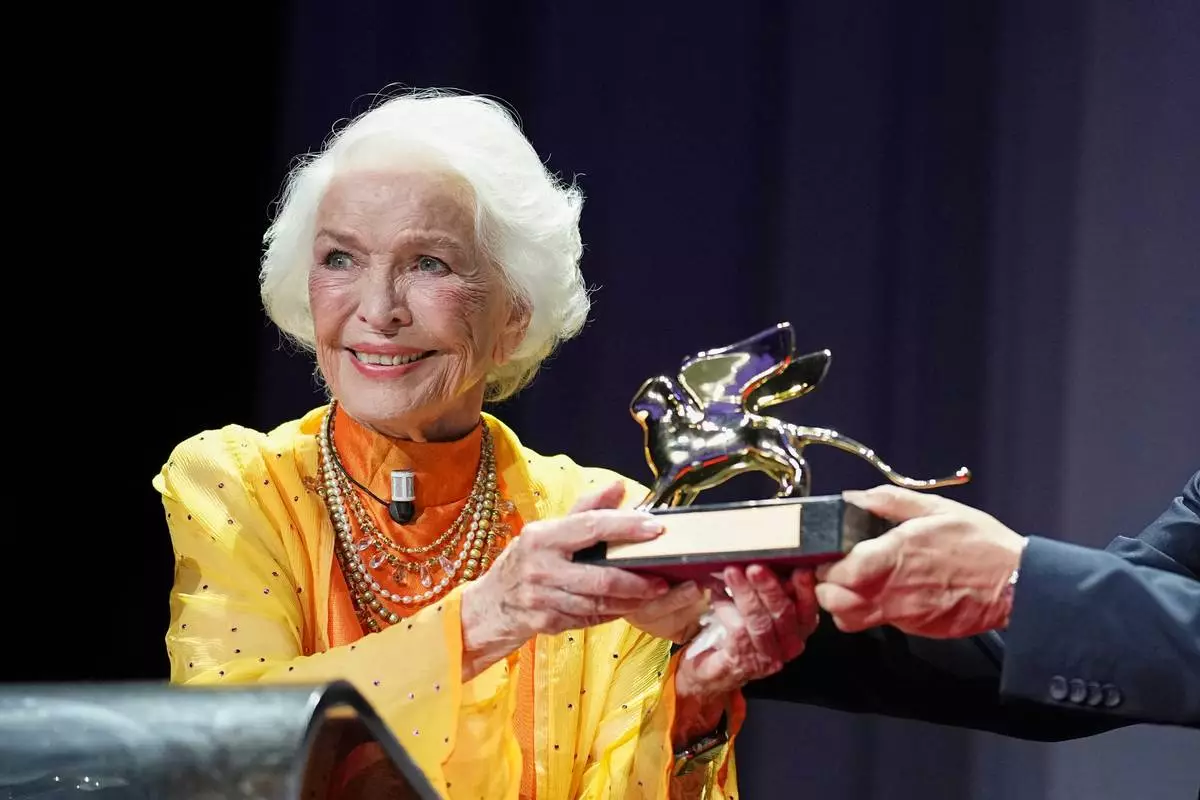Ellen Burstyn receives the golden lion for lifetime achievement during the 83rd edition of the Venice Film Festival in Venice, Italy, on Monday, Sept. 7, 2026. (Photo by Scott A Garfitt/Invision/AP)