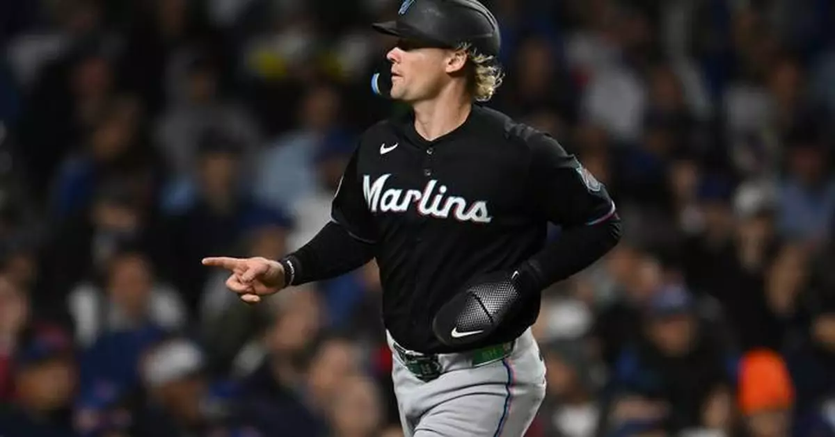 Miami Marlins stymie Chicago's push for NL wild card with 8-2 victory over the Cubs