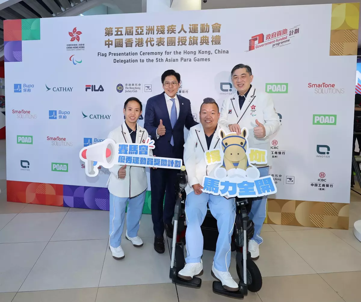 Member of the Legislative Council of the HKSAR and Steward of The Hong Kong Jockey Club The Hon Kenneth Fok (2nd left) together with Deputy Chef de Mission of the Hong Kong, China delegation to the 5th Asian Para Games John Leung (1st right) offer encouragement to para badminton player Chu Man Kai (1st left) and Boccia athlete Leung Yuk Wing (2nd right).