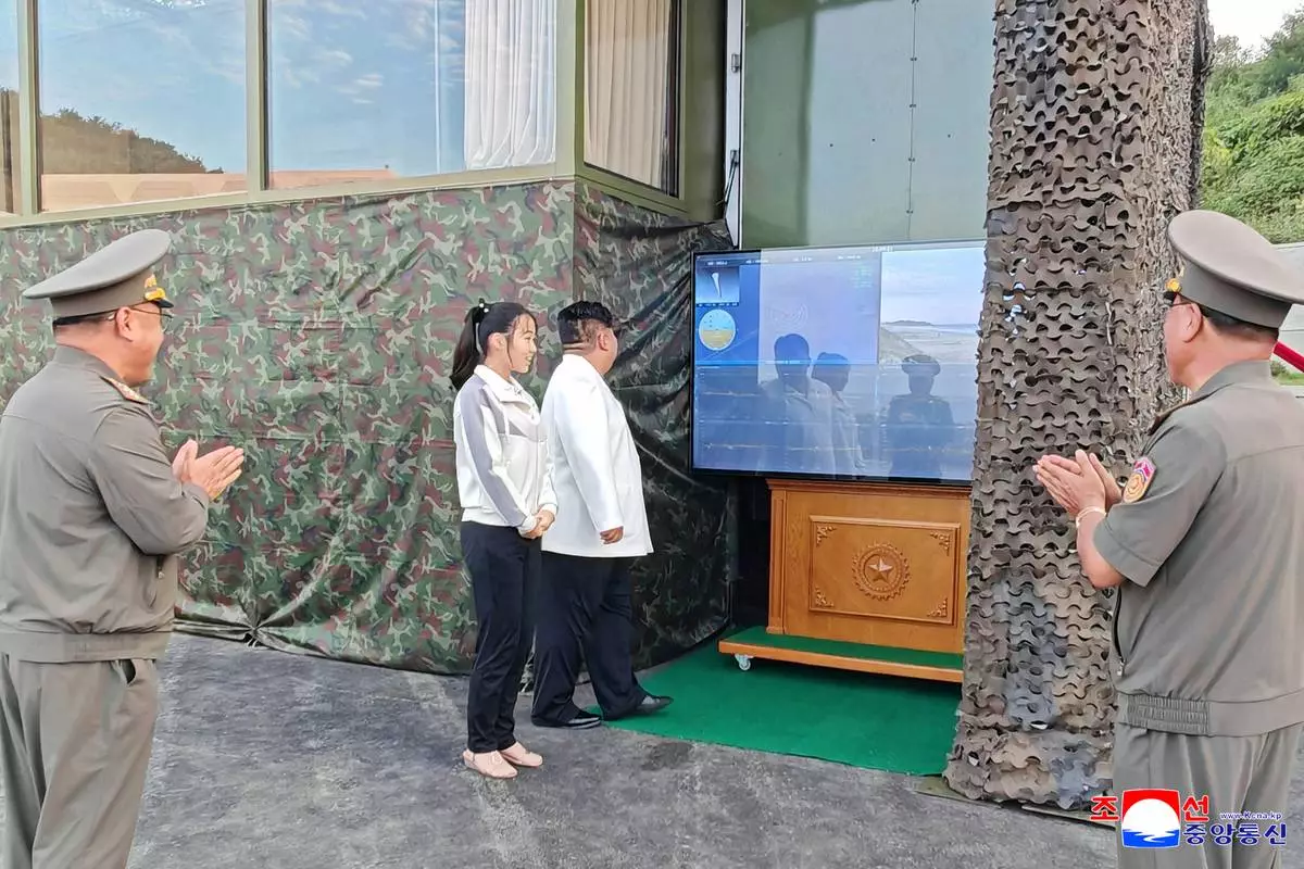In this photo provided Tuesday, Sept. 22, 2026, by the North Korean government, its leader Kim Jong Un, center right, watches missile tests in an undisclosed location, North Korea Sunday, Sept. 20, 2026. Independent journalists were not given access to cover the event depicted in this image distributed by the North Korean government. The content of this image is as provided and cannot be independently verified. Korean language watermark on image as provided by source reads: "KCNA" which is the abbreviation for Korean Central News Agency. (Korean Central News Agency/Korea News Service via AP)