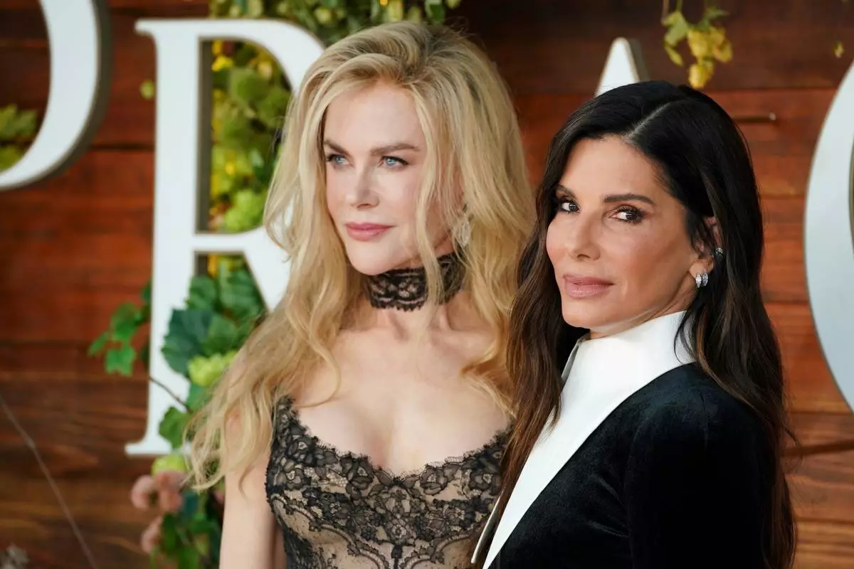 Nicole Kidman, left, and Sandra Bullock arrive at the premiere of "Practical Magic 2" on Monday, Aug. 31, 2026, at the Directors Village in Los Angeles. (Photo by Jordan Strauss/Invision/AP)