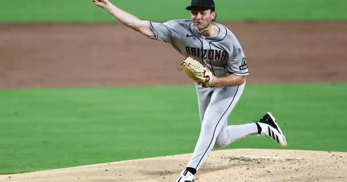 Arenado, Perdomo lead Diamondbacks over Padres 11-4 to stay alive in wild-card hunt