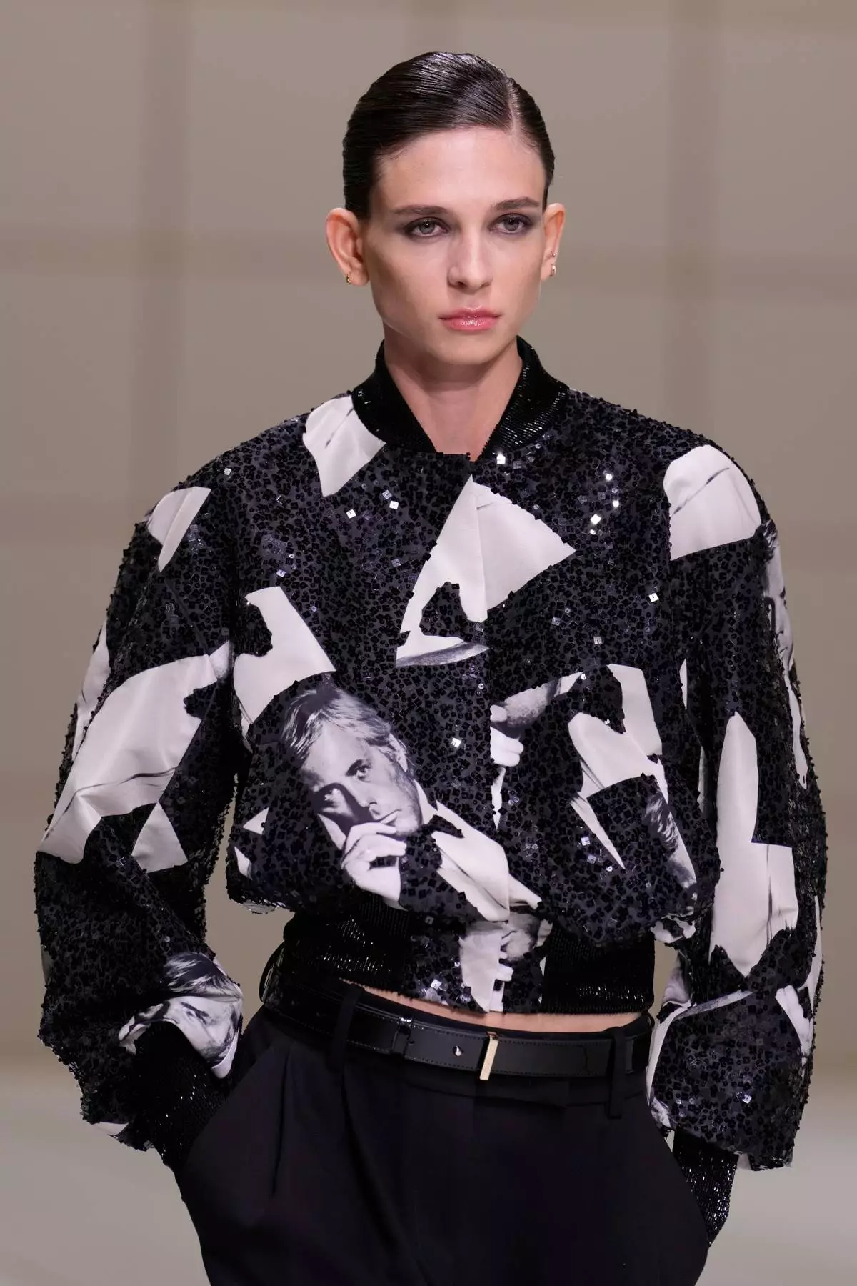 A model wears a creation part of the Giorgio Armani women's Spring-Summer 2027 collection, presented in Milan, Italy, Sunday, Sept. 27, 2026. (AP Photo/Luca Bruno)