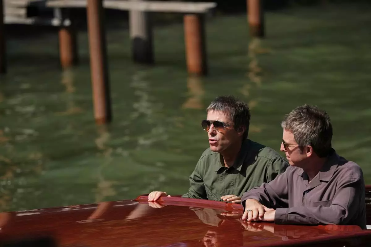 Liam Gallagher, left, and Noel Gallagher arrive at the 83rd edition of the Venice Film Festival in Venice, Italy, on Saturday, Sept. 5, 2026. (Photo by Alessandra Tarantino/Invision/AP)