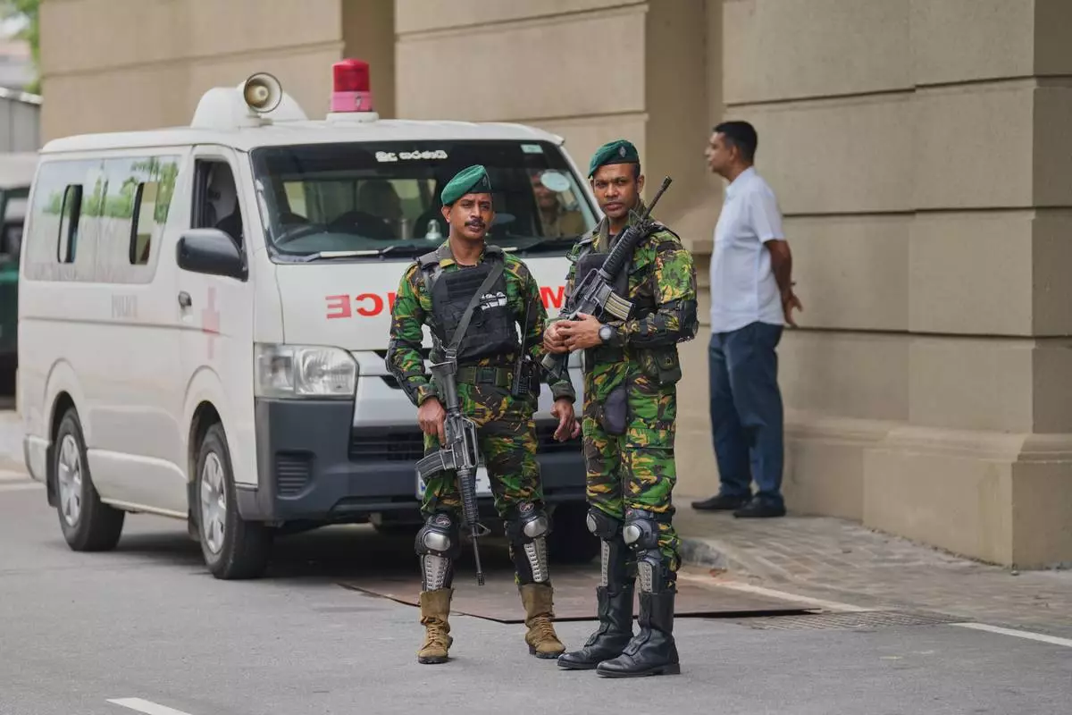 Police commandos stand guard at the High Court complex ahead of a verdict related to the 2019 Easter bombings in Colombo, Sri Lanka, Tuesday, Sept. 22, 2026.(Eranga Jayawardane)