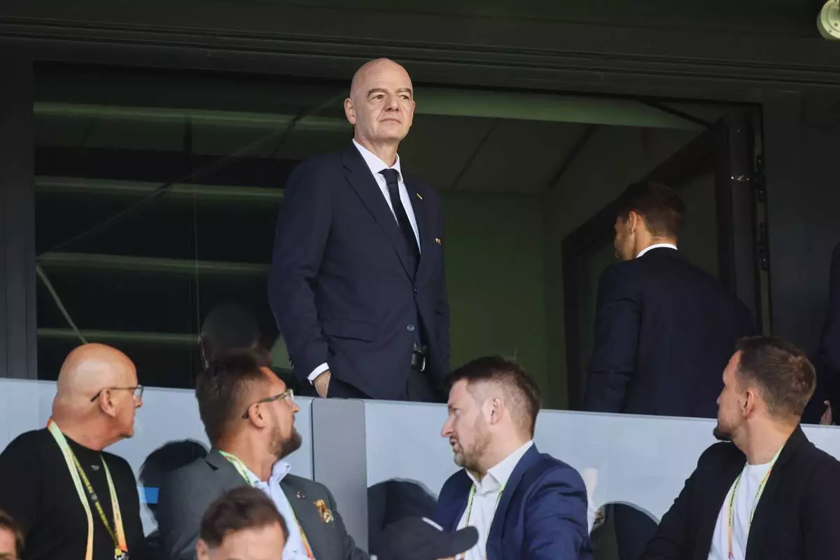 FIFA President Gianni Infantino attends the opening game of the Women's U20 World Cup opening match between Poland and Argentina in Katowice, Poland, Saturday, Sept. 5, 2026. (AP Photo/Beata Zawrzel)