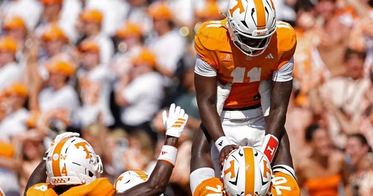 Freshman QB Brandon accounts for 5 TDs to lead No. 20 Tennessee over Furman 56-9