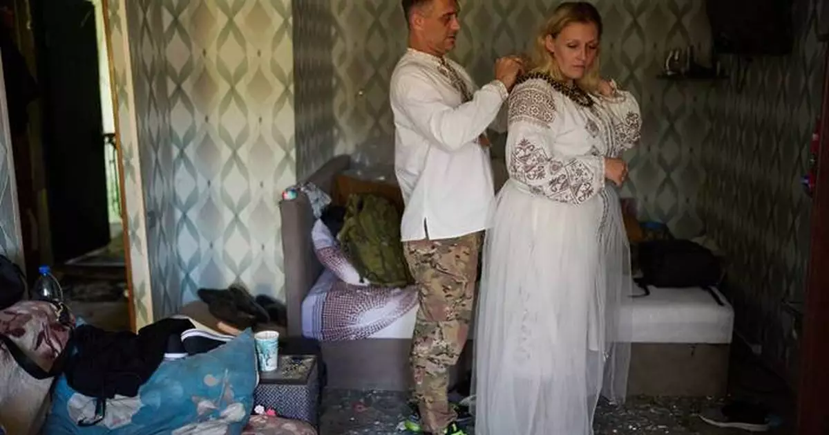 A Russian strike tore apart a couple's home on the eve of their wedding. They still got married