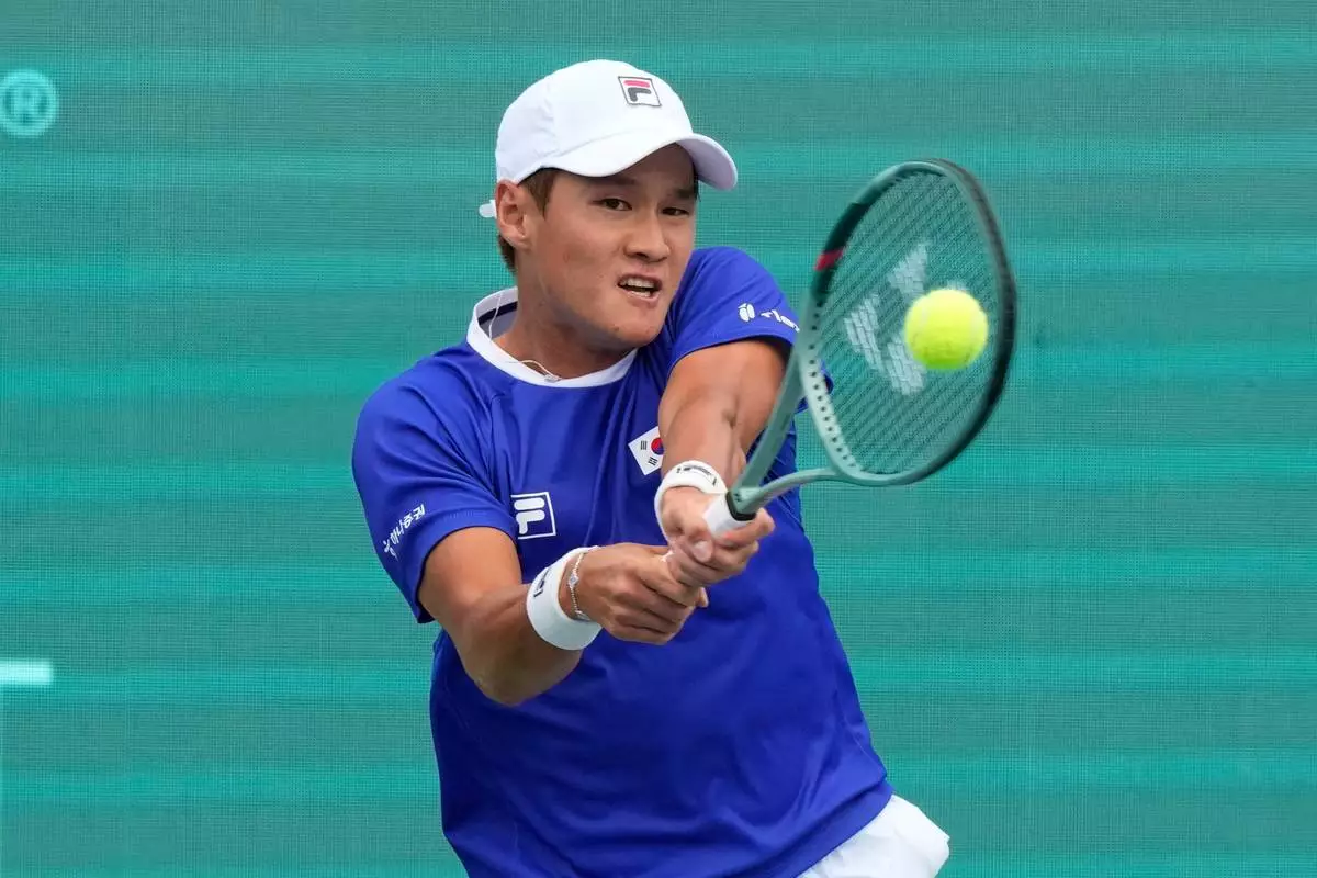 South Korea's Soonwoo Kwon returns a shot to India's Dhakshineswar Suresh during a Davis Cup second-round qualifier between South Korea and India in Seoul, South Korea, Friday, Sept. 18, 2026. (AP Photo/Ahn Young-joon)