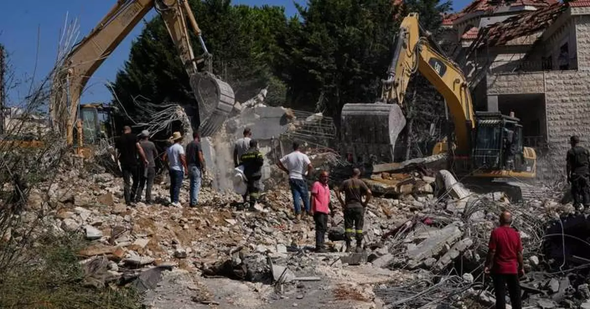 Israeli airstrikes hit a Lebanese village, killing 9, and other Mideast developments