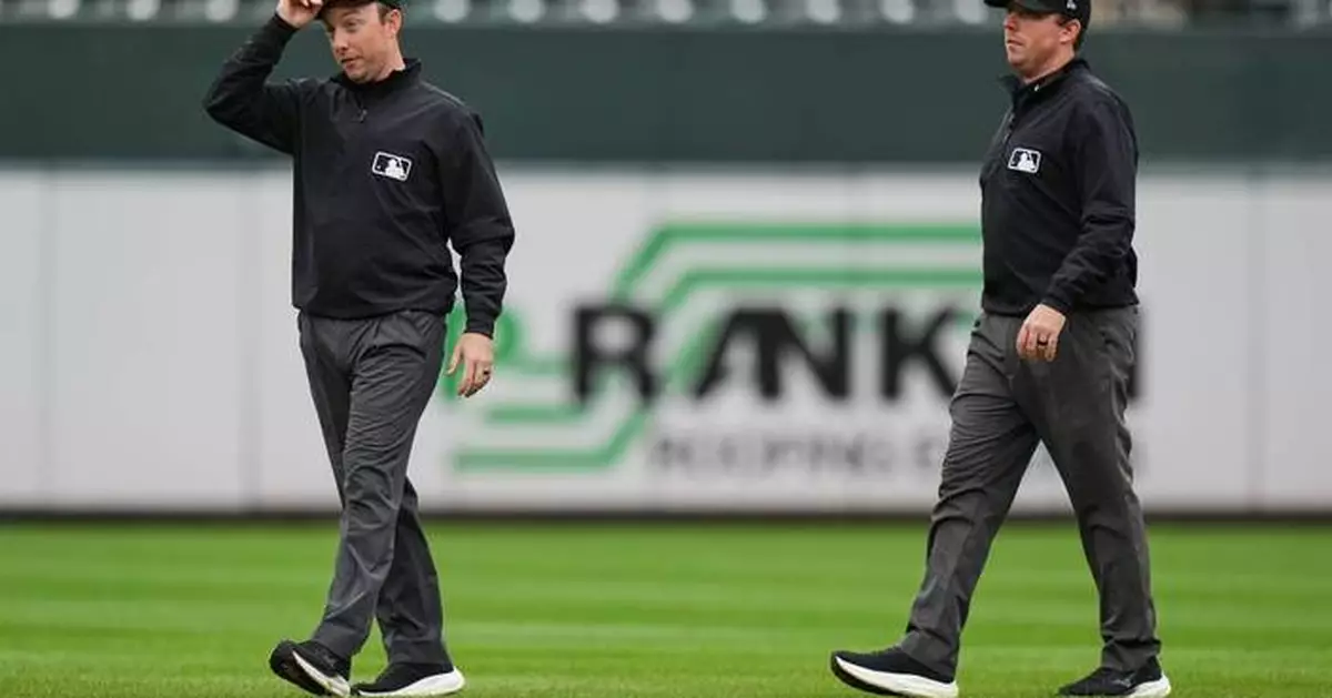 Twin brothers Austin and Tyler Jones ump big league games together for the first time