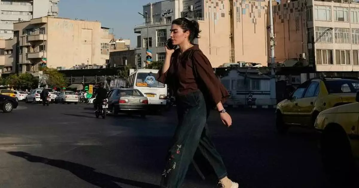 Iran hesitates to clamp down on defiance of headscarf rules as war and economic pressures mount
